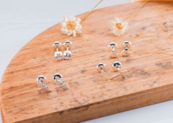 brinco com tarraxa baby